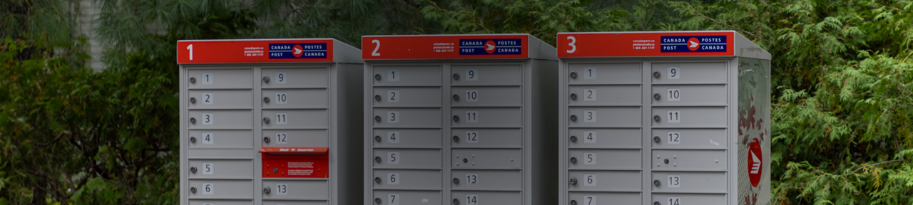 Row of three Canada Post mailboxes