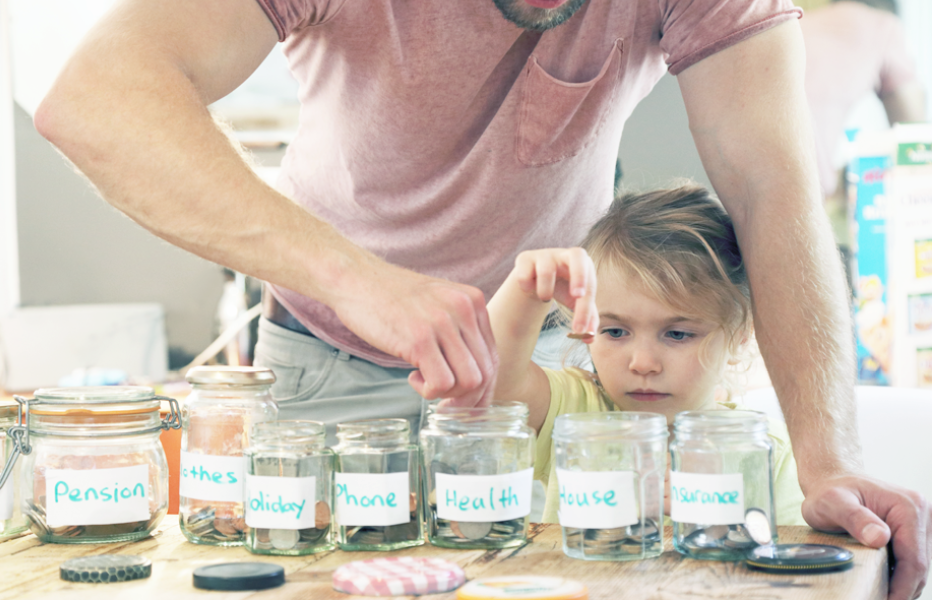 Parent and Child Saving Coins in Jars